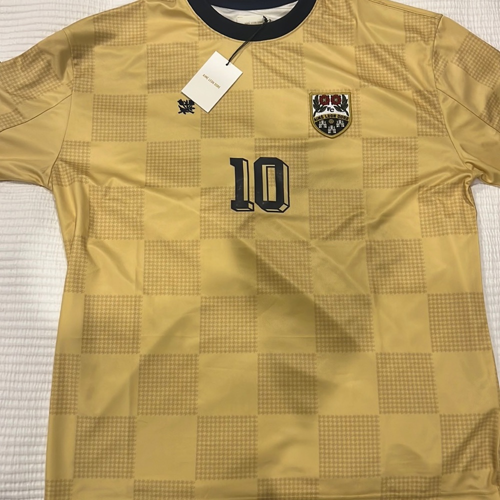 Aime Leon Dore gold jersey #10. Brand new with tag, never worn.